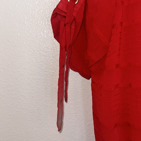 Sheer red blouse size medium with reaching at the bottom and ties on on side - Picture 6 of 8